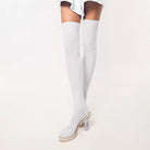 White thigh-high socks with clear high-heeled shoes on a white background