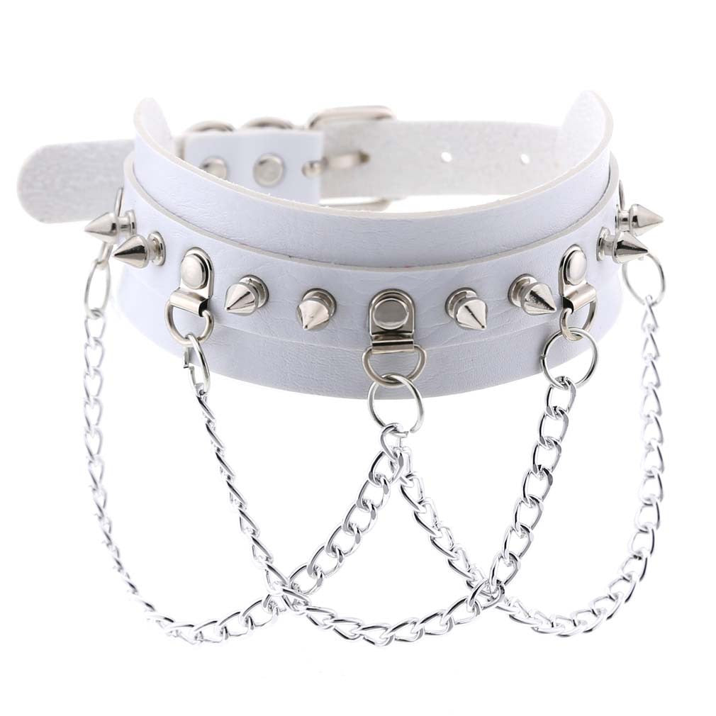 White leather collar with spikes and chains on a white background