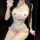 A femboy wear a white sweet cat lingerie set